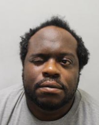 Double killer denies stabbing prison officer with pen