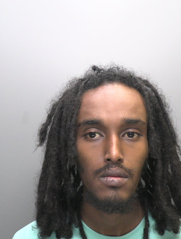 Delivery driver runs red light and gets caught with blade