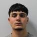 Boat migrant admits murdering shop worker